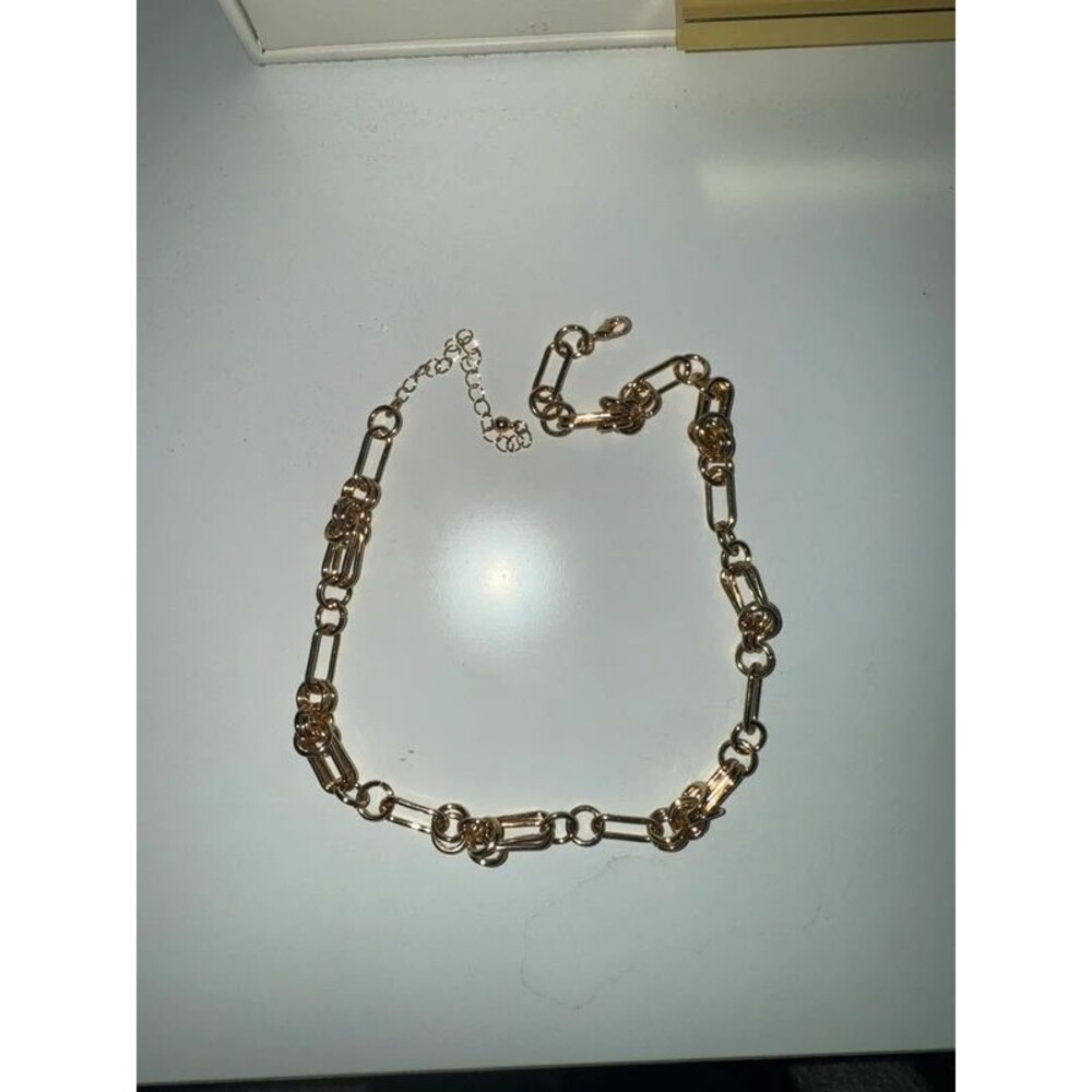 Gold necklace with chain detail